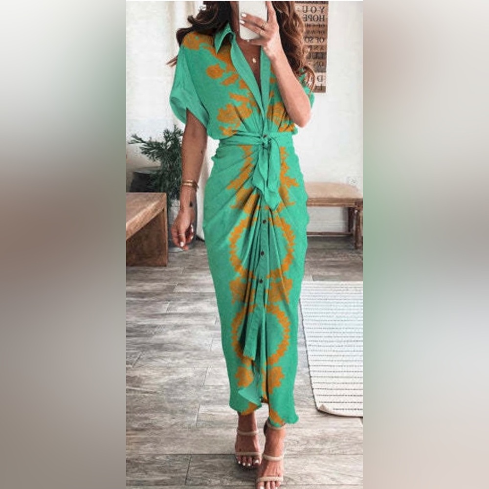 Style and comfort! Figure hugging lightweight button up wrap dress with belt